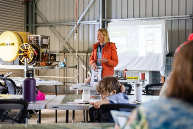 Hannah presenting to the audience at the workshop