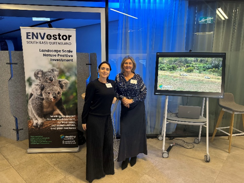 Telstra symposium Julie and Alberta at HLW stand